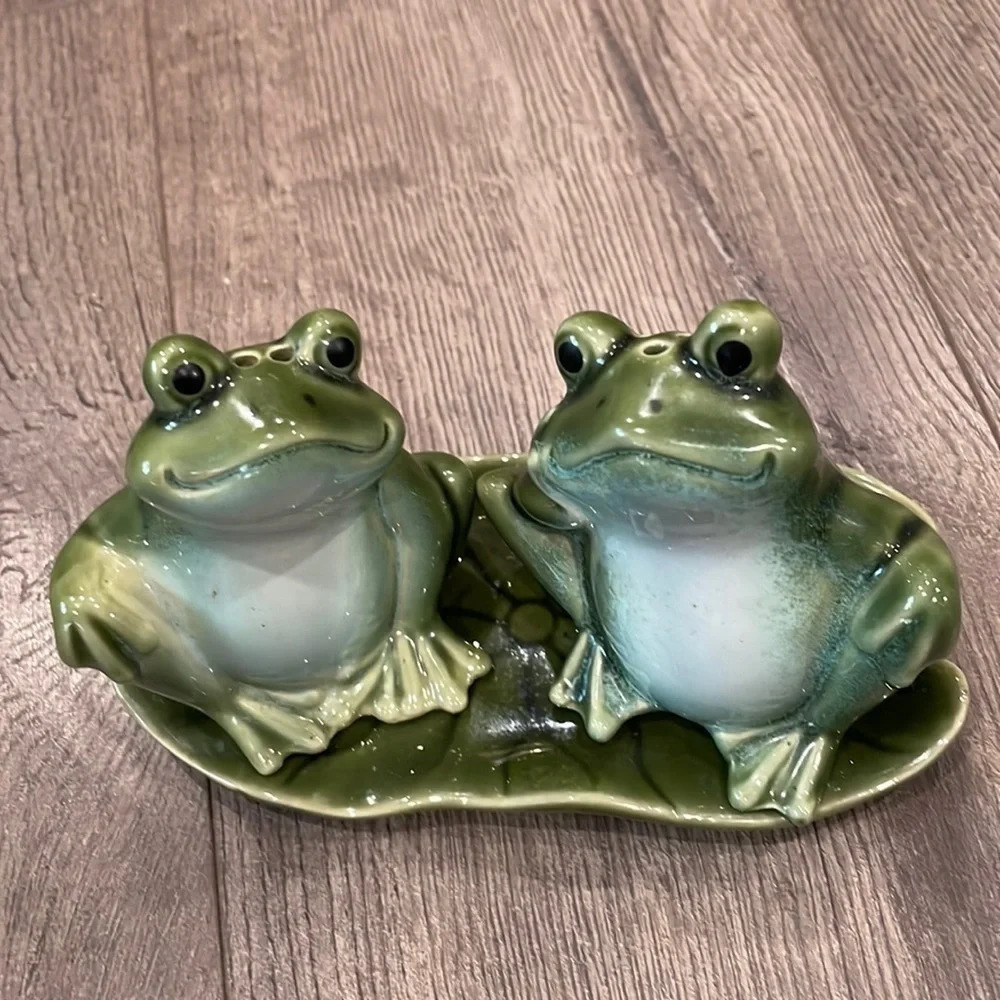 Pier 1 Import Frog Salt and Pepper Shakers on a  lily pad